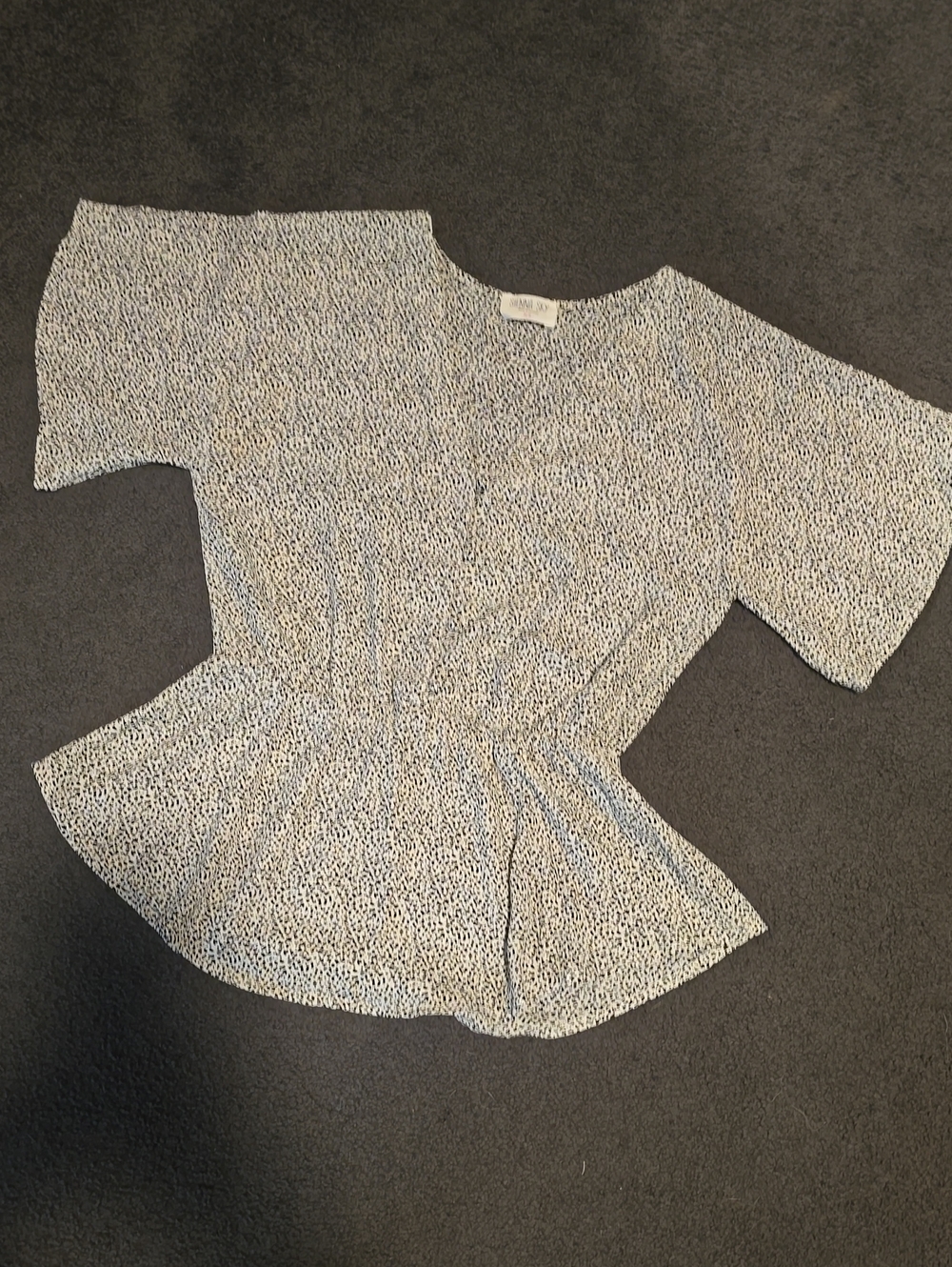 Sienna Sky White and Black Dotted Peplum Top